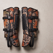 Camo snake gaiters flat lay showing the reinforcement panels and dual buckles